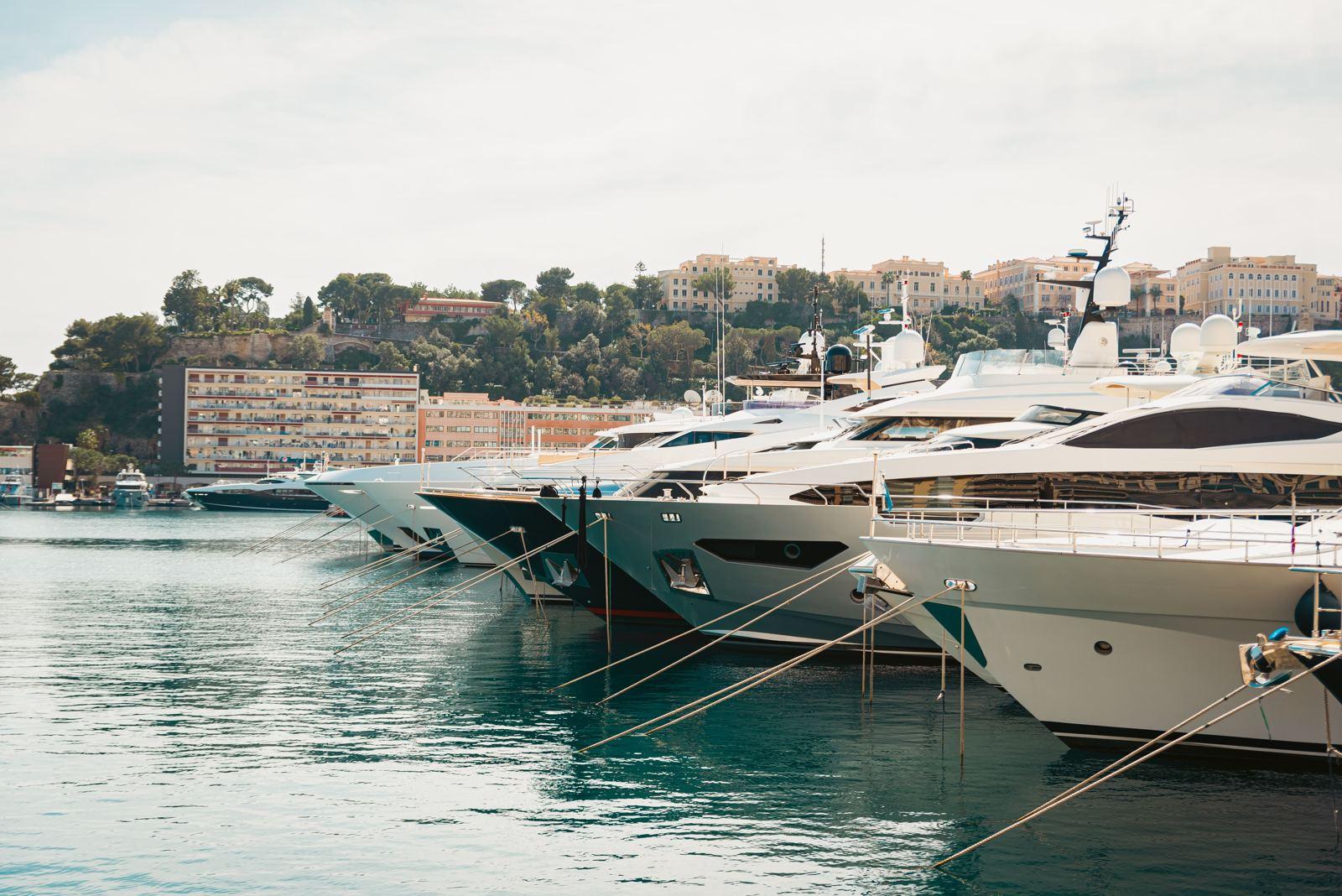 Superyachts moored in a Mediterranean harbour