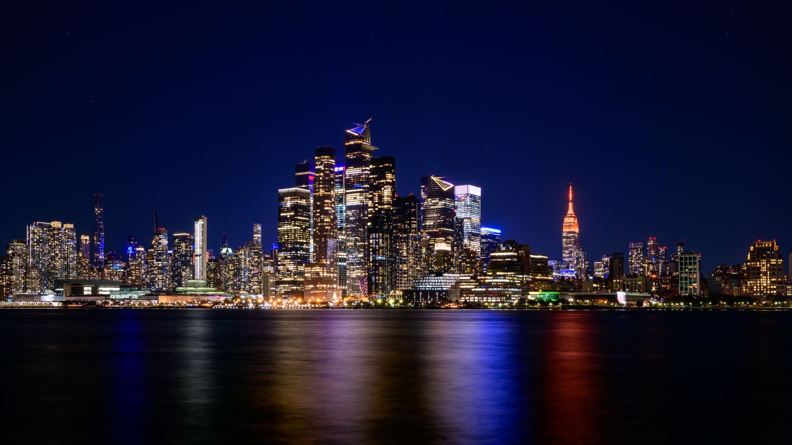 Manhattan skyline at night across the Hudson River